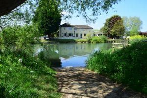 View across the river in Eaton to the Ferryman pub