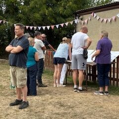 Group of people looking at the PAvilion Plans