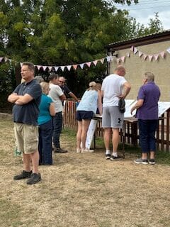 Group of people looking at the PAvilion Plans